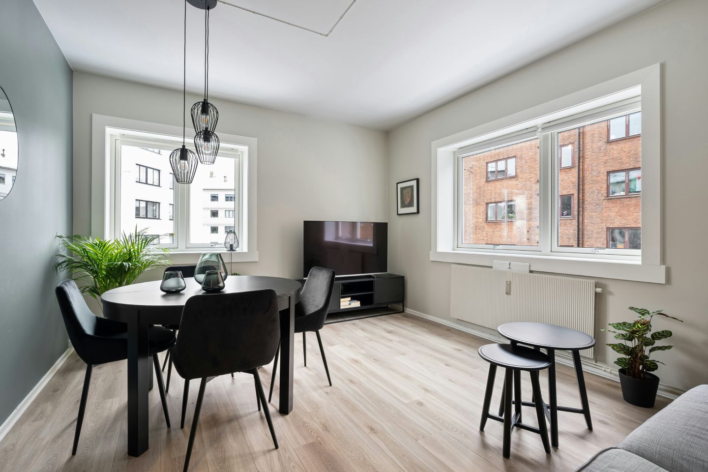 A living room filled with furniture and a flat screen TV